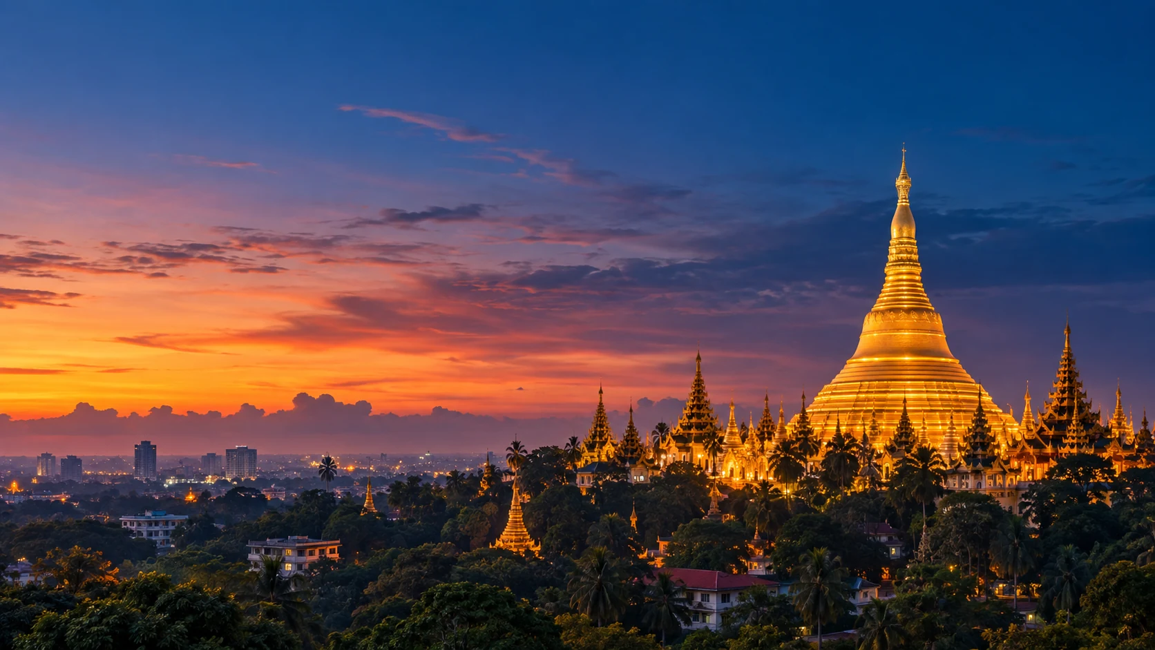 Shwedagon Pagoda above the Yangon skyline at dusk